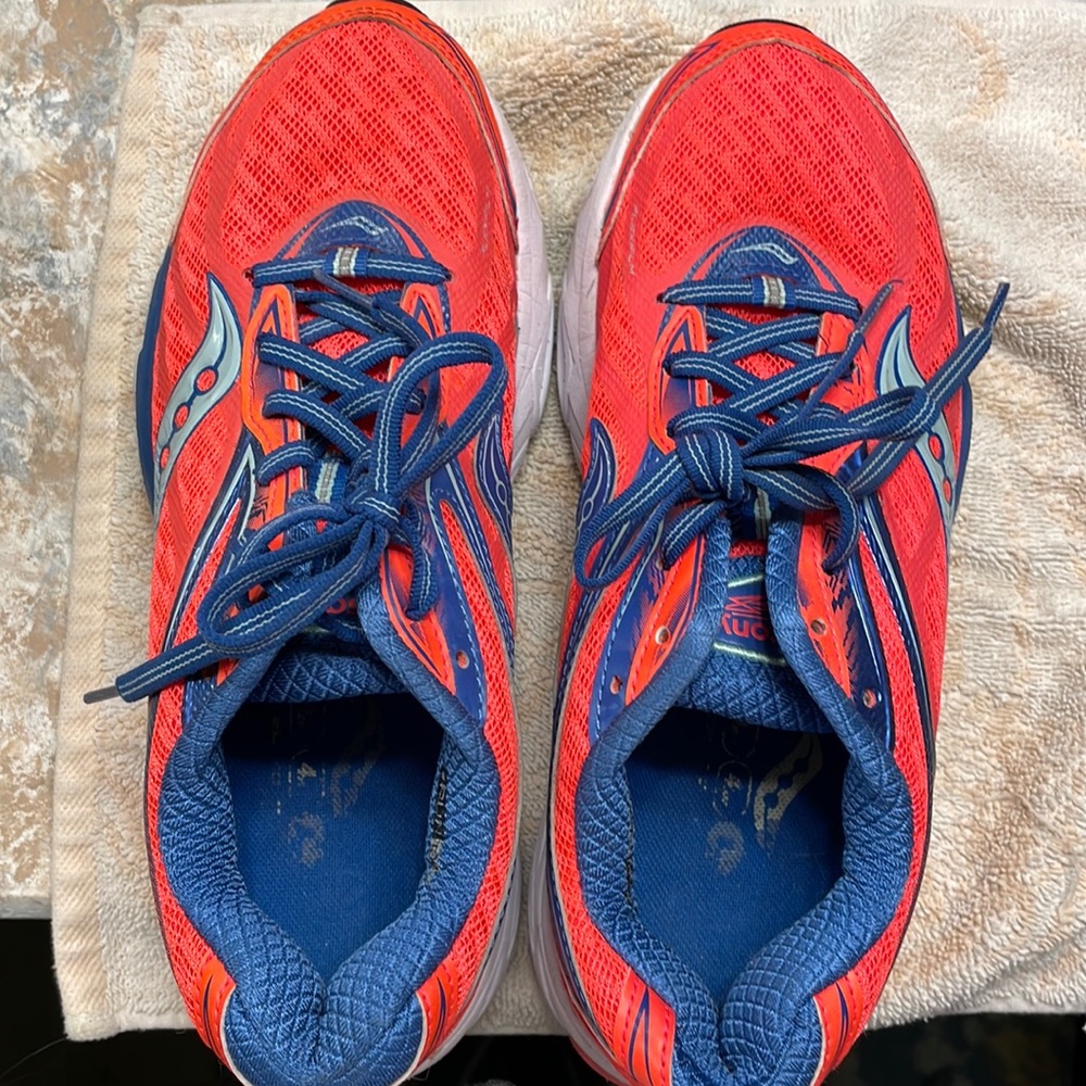 Saucony Size 8 Athletic TS in bright  fluorescent orange and baby blue.